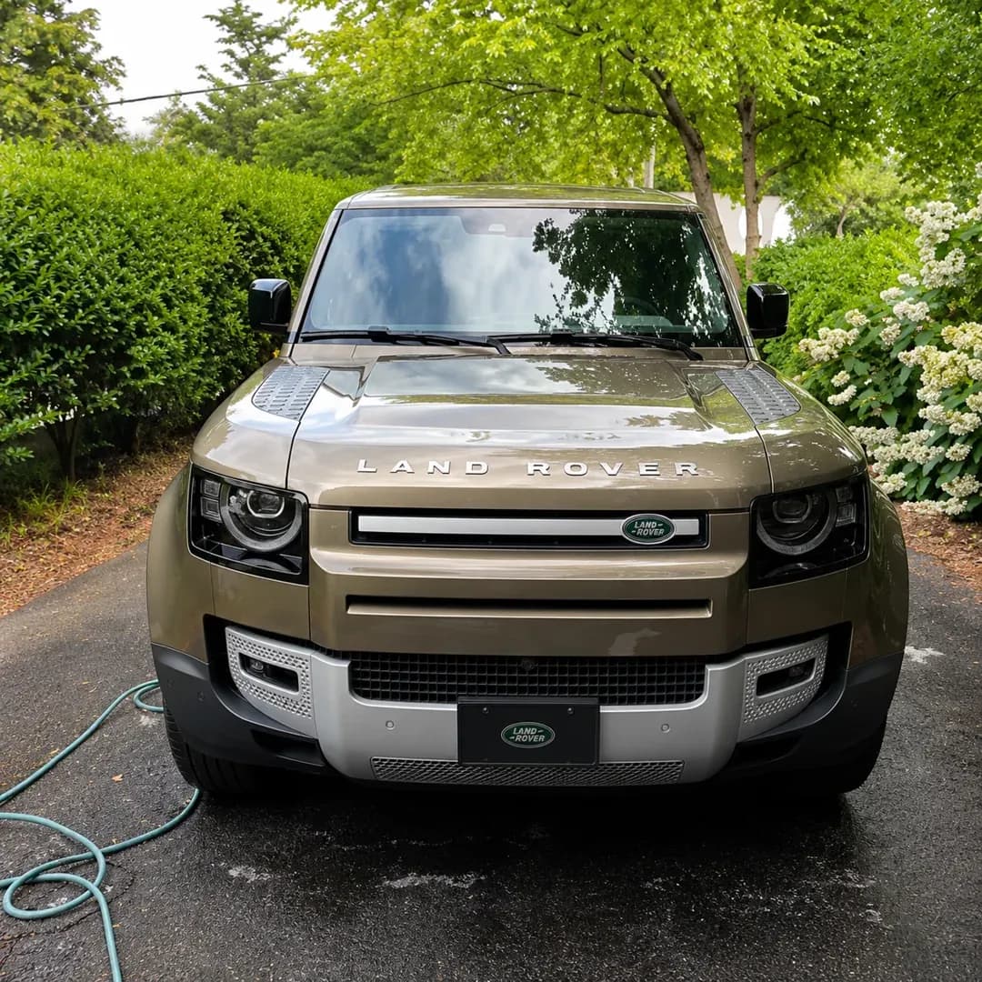 Land Rover Defender detailed to a deep gloss front view
